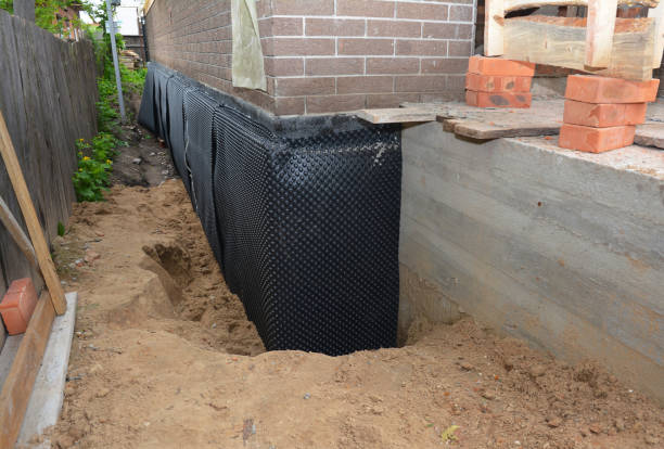 SJ Waterproofing Pros technician performing targeted Vapor Barrier Installation assessment in Stanley, NY